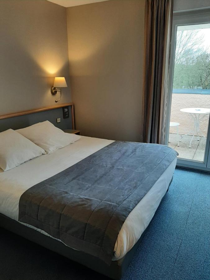 Hotel Au Relais De L'Oust Lanouée Esterno foto