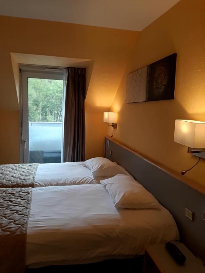 Hotel Au Relais De L'Oust Lanouée Esterno foto